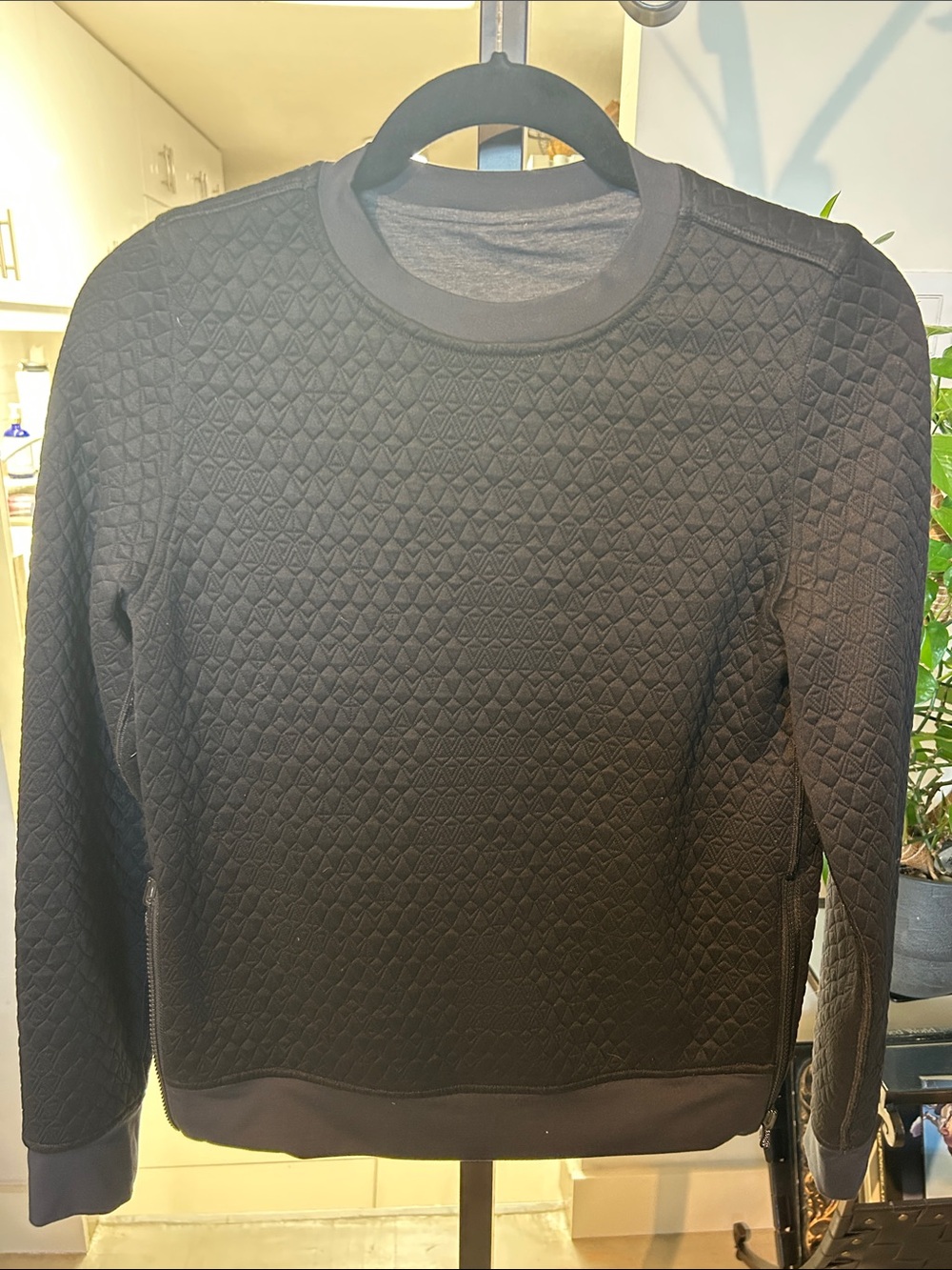 Womens Quilted Black Crewneck Sweater. With zip waist details